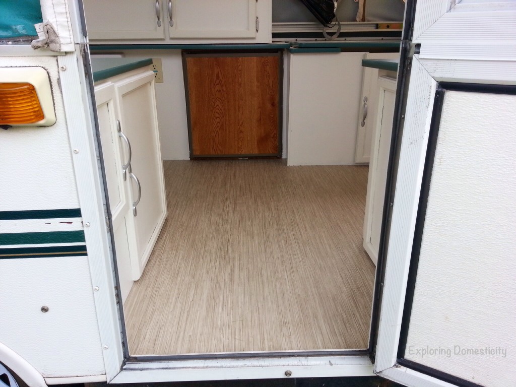 Pop Up Camper Remodel: painting and Flooring 
