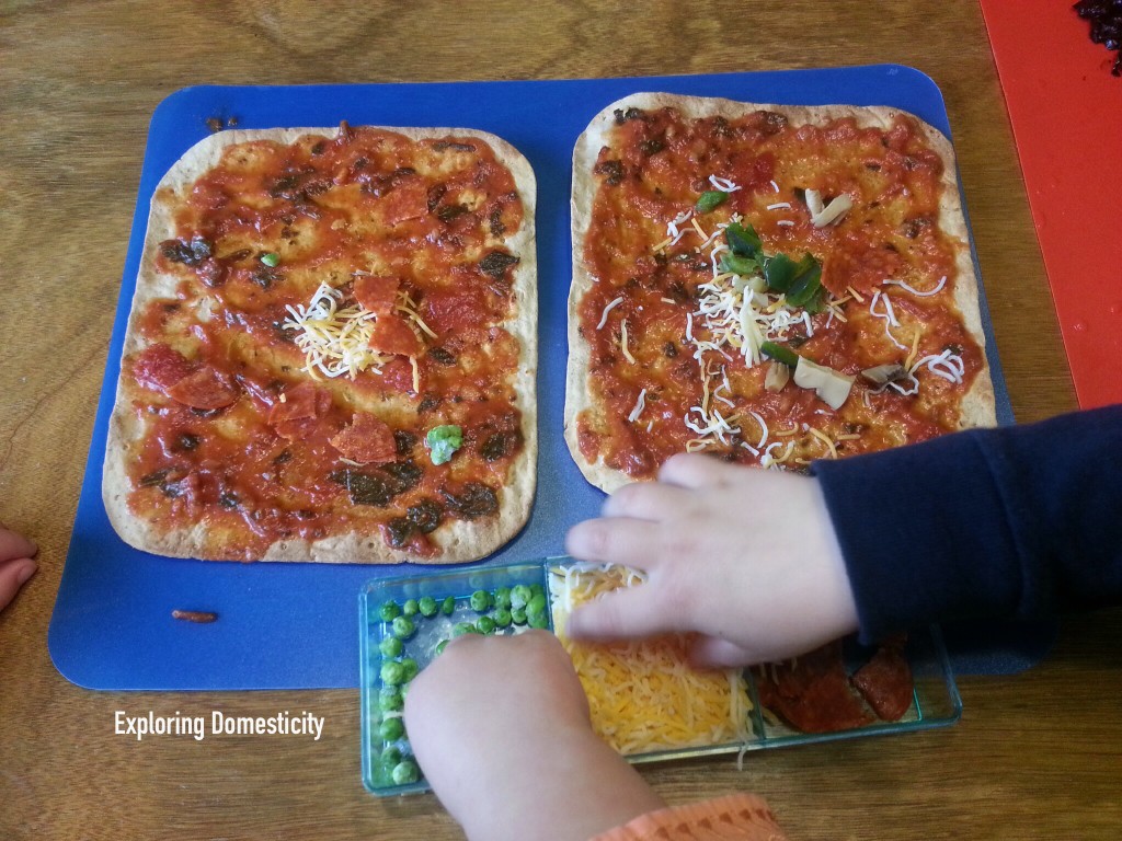 Make-your-own flatbread pizza: perfect for kiddos - keeps them busy, gets them to eat their veggies, and quick and easy way to use leftover or what you have on hand