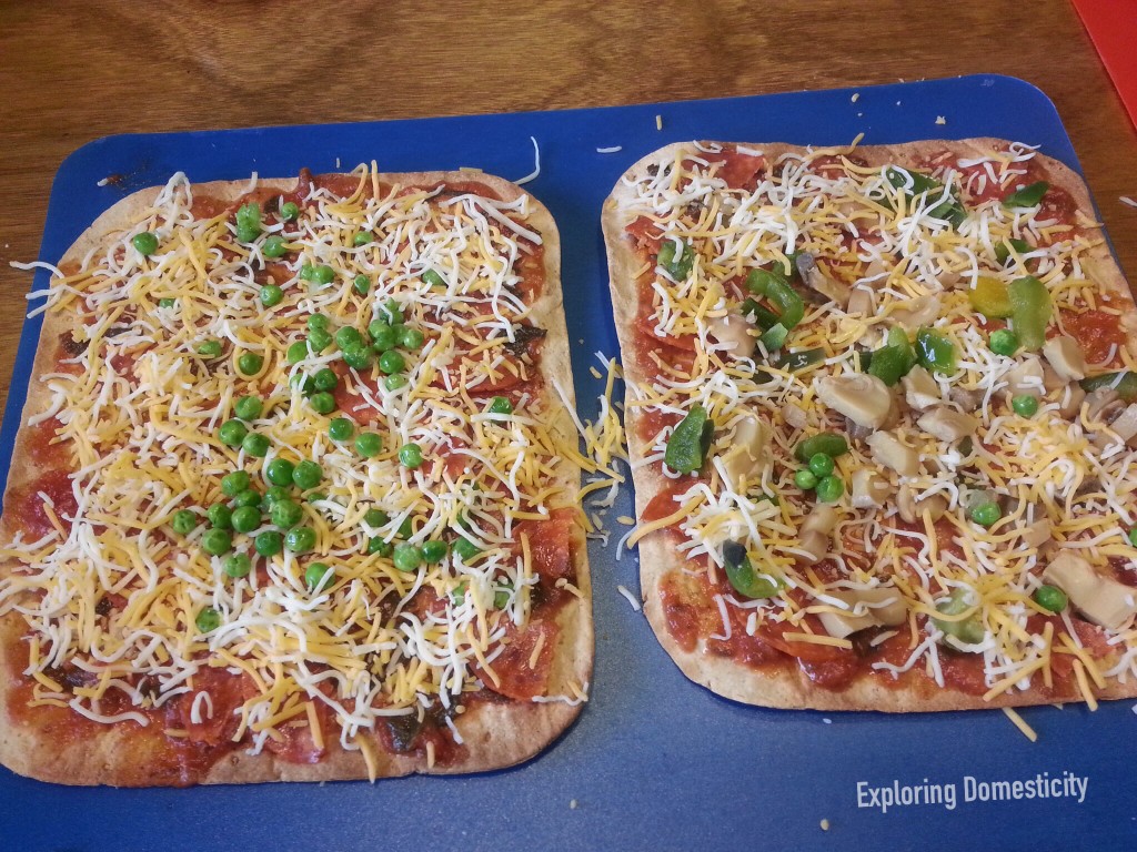 Make-your-own flatbread pizza: perfect for kiddos - keeps them busy, gets them to eat their veggies, and quick and easy way to use leftover or what you have on hand