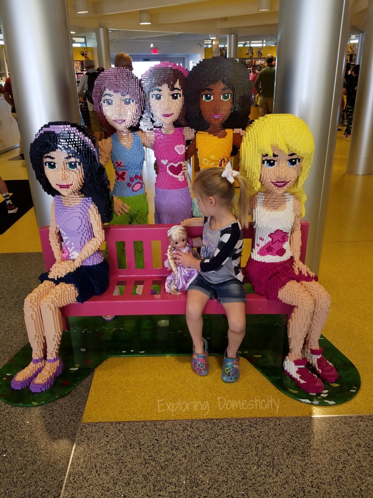 Disney Springs Lego Store with Disney Precious Moments Doll Exploring Domesticity