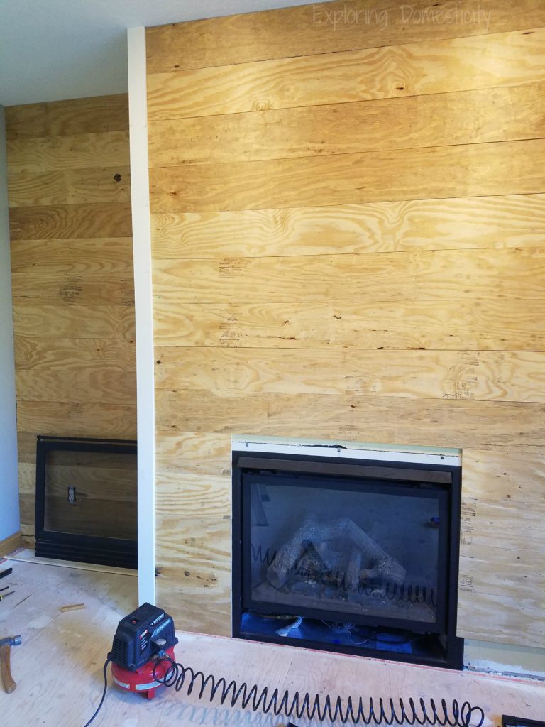 DIY Faux Shiplap Wall in progress with corners up