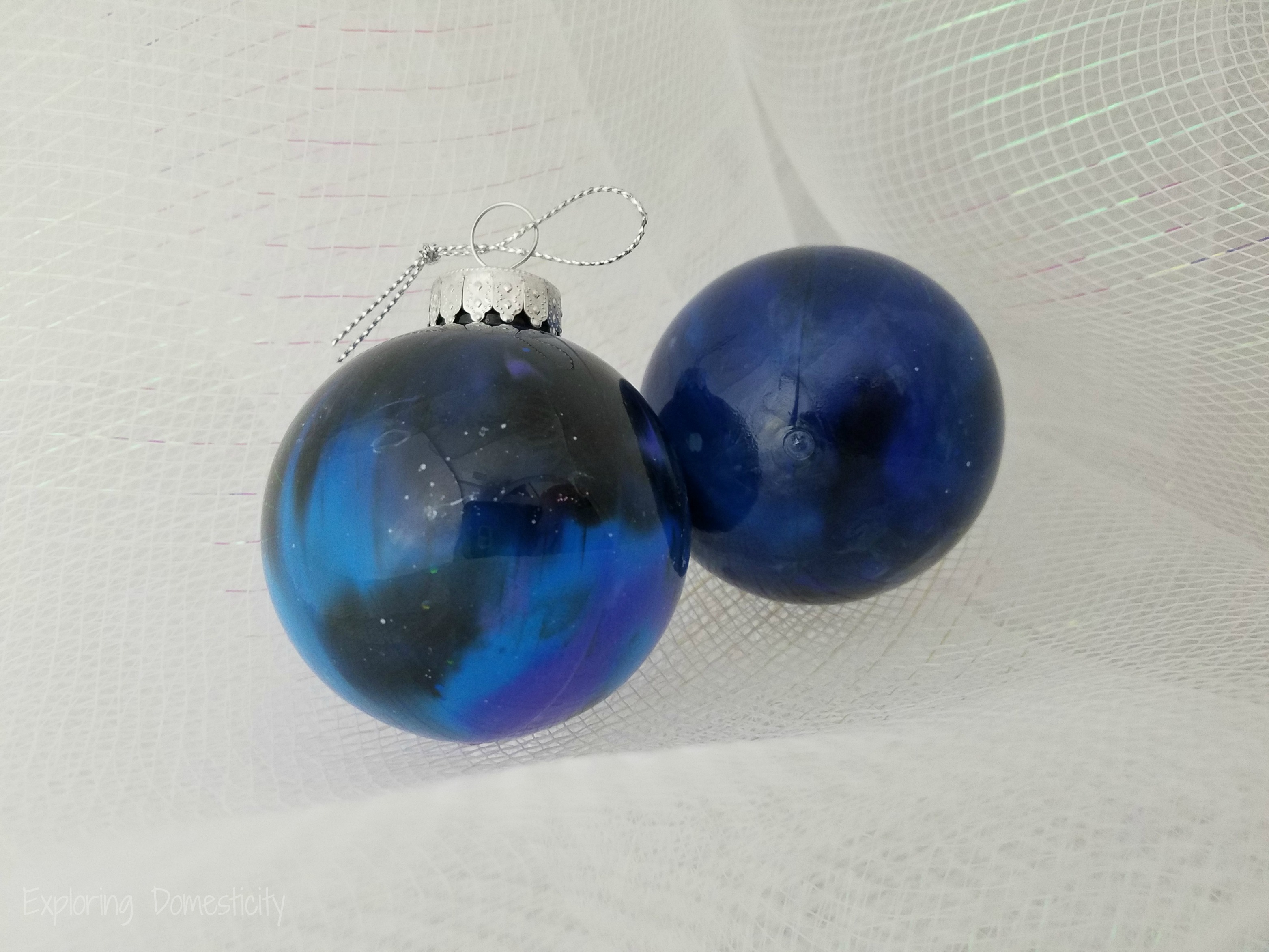 DIY Galaxy Ornaments with acrylic paint
