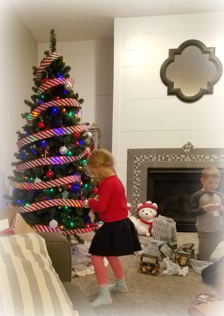 Kids decorating the Christmas tree - tips for creating memorable holiday moments