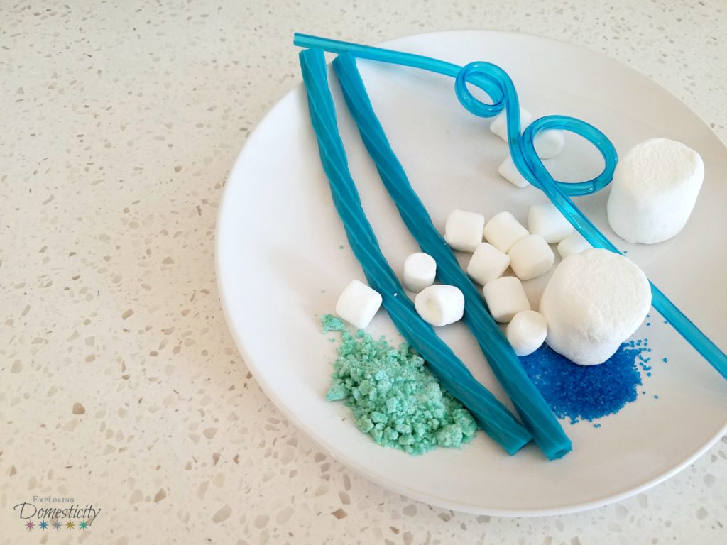 Frozone Float - blue float with blue licorice, blue pop rocks, blue sprinkles, and marshmallows
