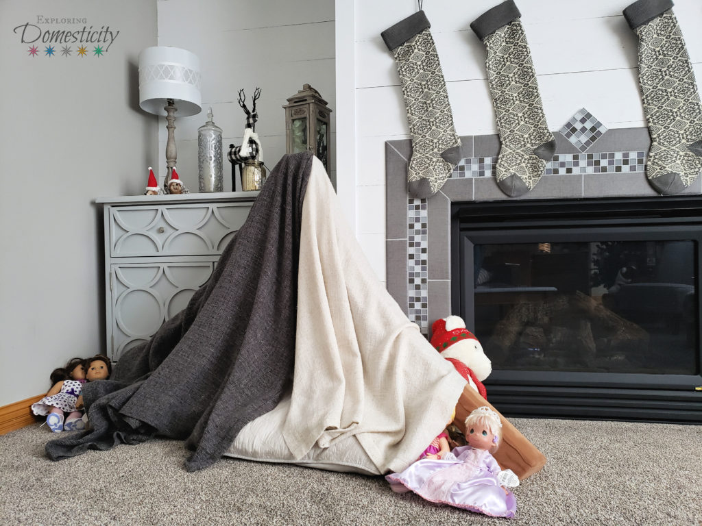 kids fort with blankets and balance beam