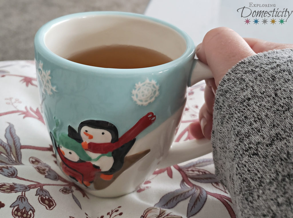Keep Warm with cozy blankets, a fire, and warm tea