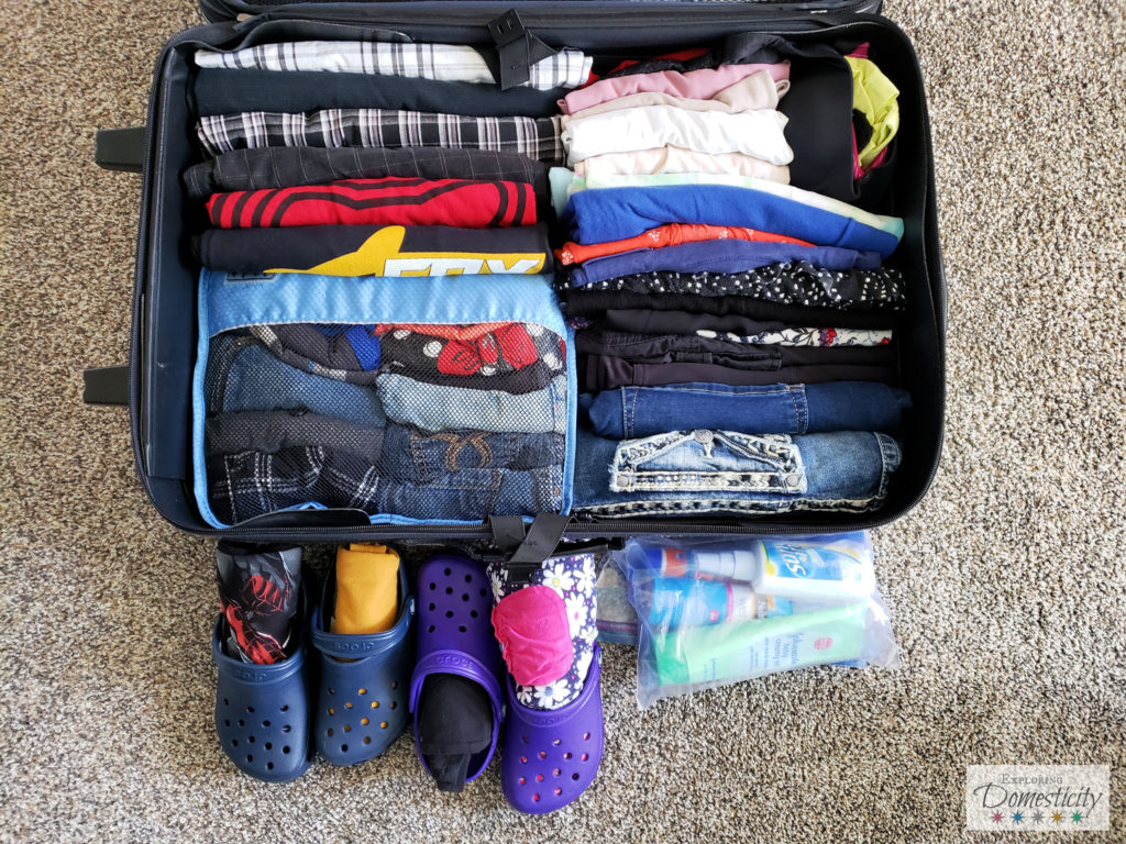 Fit clothes for 4 people in 1 suitcase thanks to vacuum bags! :  r/organization