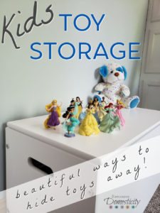 Toy box with Disney princesses and toys on top - Kids Toy Storage Solutions - beautiful ways to hide toys away