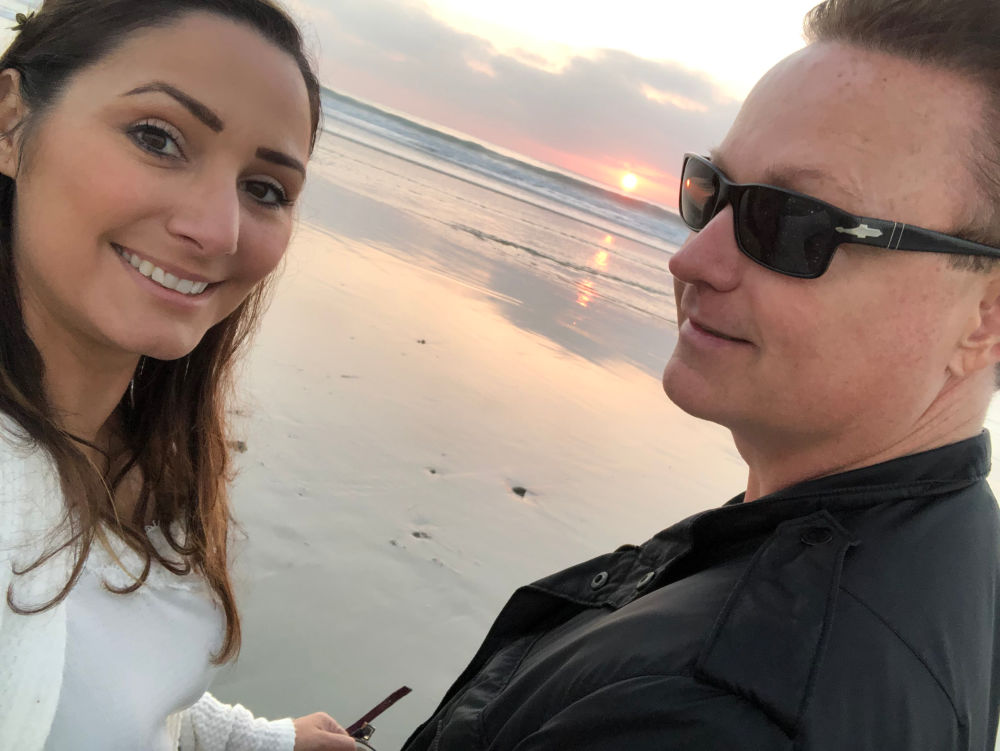 Liz's Mom Life Interview - photo of Liz and her husband on the beach
