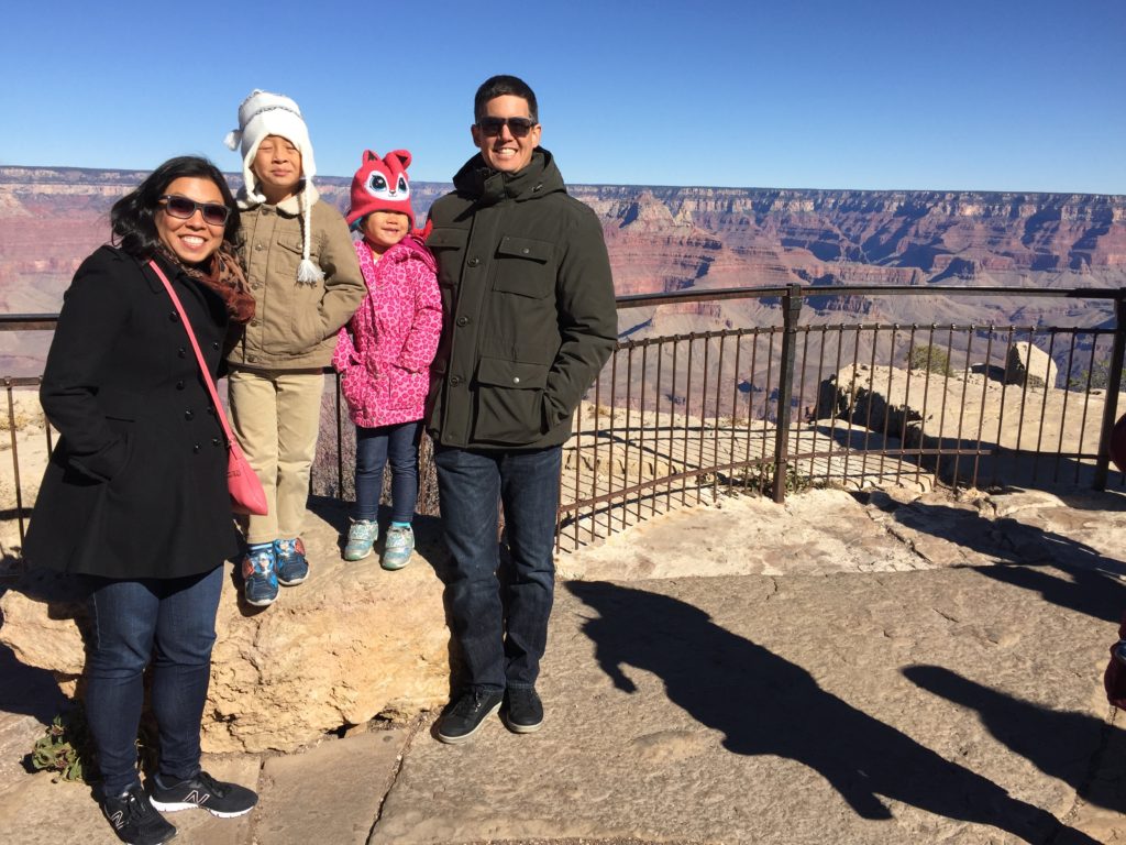 Family with a boy and a girl at the Grand Canyon