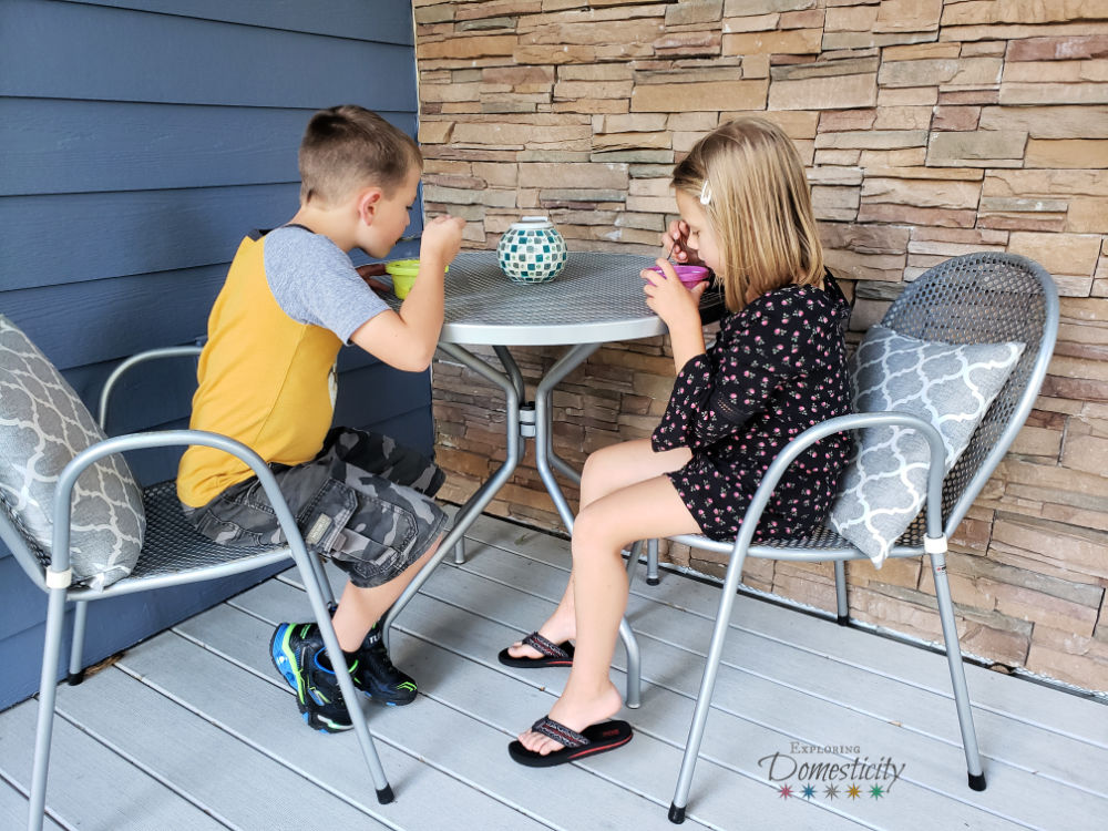 Kids eating ice cream on the porch