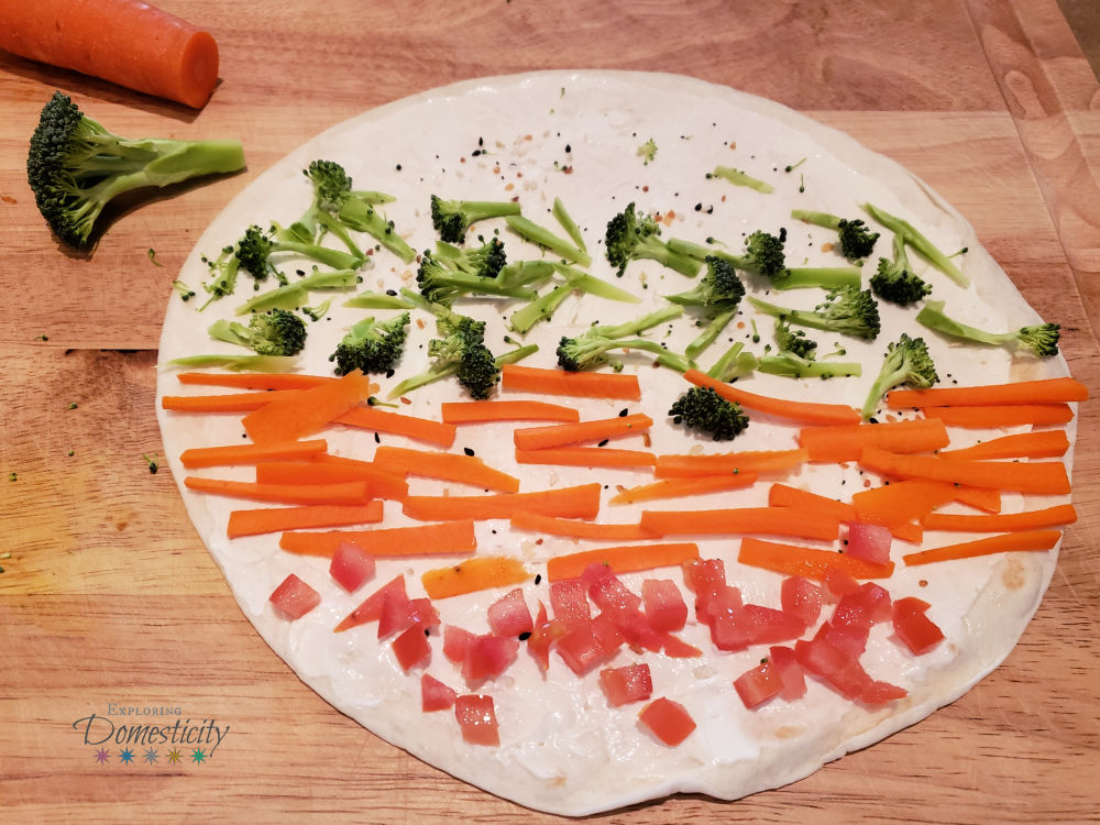 Pinwheel sandwiches tips - making a veggie pinwheel sandwich with cream cheese tomato carrot and broccoli