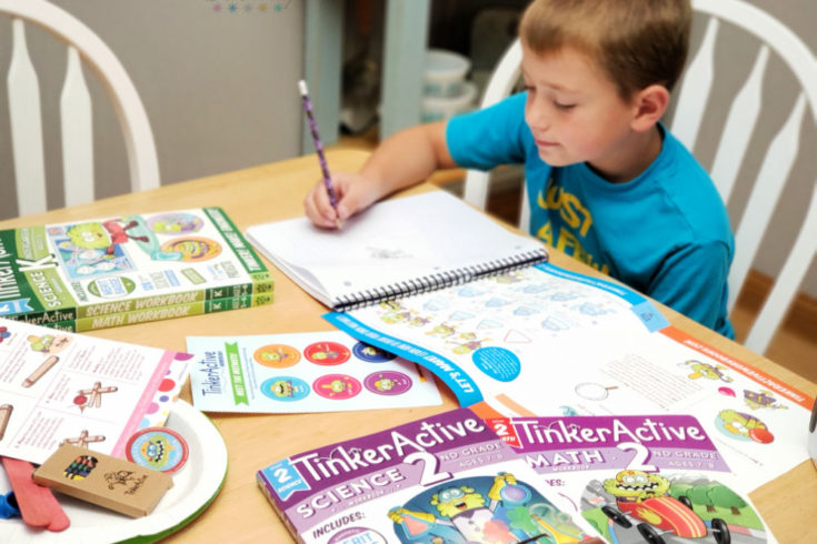 TinkerActive Workbooks and little boy working