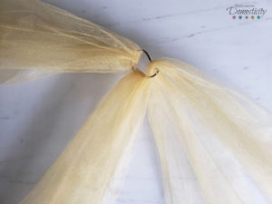 Rapunzel hair DIY braid - attaching the tulle