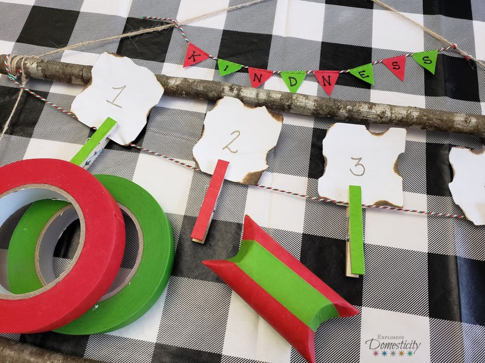 red and green masking tape for Christmas Kindness Calendar and toilet paper roll gift box