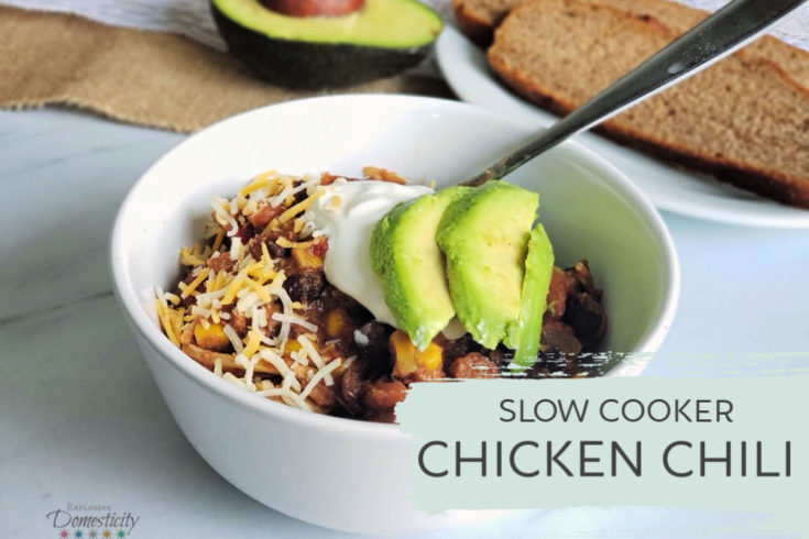 Chicken Chili with sour cream, cheese, and avocado feature