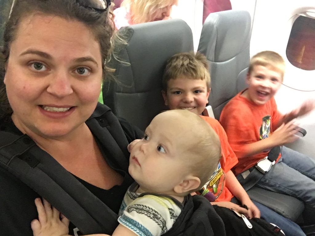 Caitlin G's Mom Life - Mom and kids on airplane