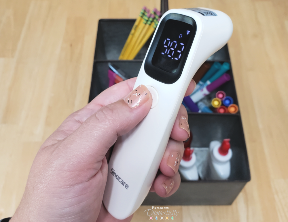 Touchless thermometer with school supplies