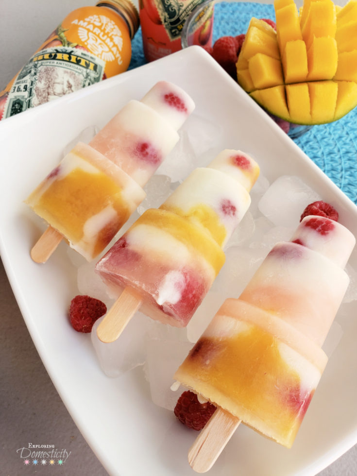Fruit and Yogurt Popsicles with AMARUMAYU superfruit juice mango and raspberries